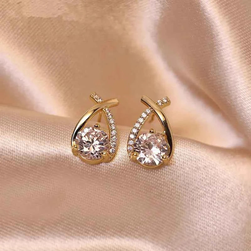 925 Sterling Silver 0.5ct Moissanite Fishtail Cross Stud Earrings, Drop Piercing Design – Melisande