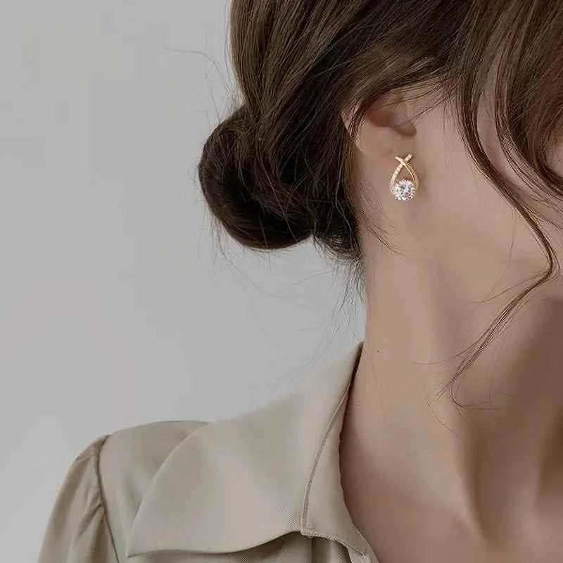 925 Sterling Silver 0.5ct Moissanite Fishtail Cross Stud Earrings, Drop Piercing Design – Melisande